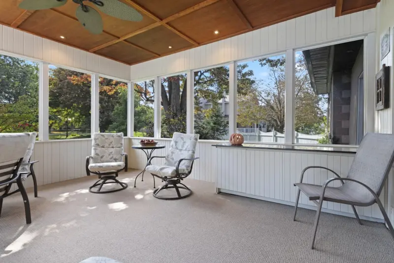Designing a Year‑Round Sunroom Addition That Works for Work, Play, and Wellness